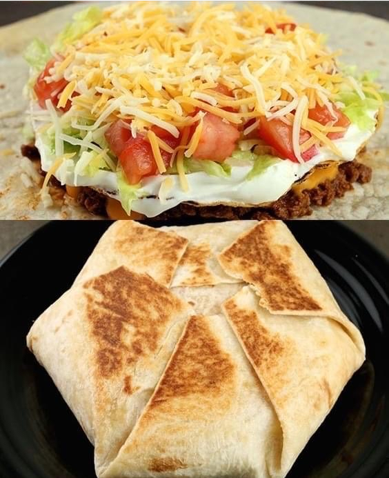 Delicious homemade Crunch Wrap Supreme, golden and crispy on the outside with a melty, savory filling of seasoned beef, nacho cheese, and fresh vegetables, served on a stylish slate serving platter
