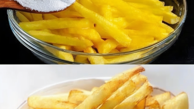 Crispy and golden oil-free fries served on a bright plate, sprinkled with paprika and finely chopped rosemary, showcasing a healthy alternative to traditional fried potatoes