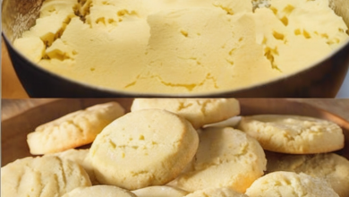 Butter cookies arranged on a plate, freshly baked and golden brown, ready to be enjoyed with a cup of tea