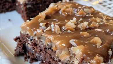 German Chocolate Sheet Cake topped with rich coconut-pecan frosting, sliced and ready to serve on a rustic wooden table German Chocolate Cake Recipe Best Chocolate Cake Easy Sheet Cake Recipe Homemade German Chocolate Cake