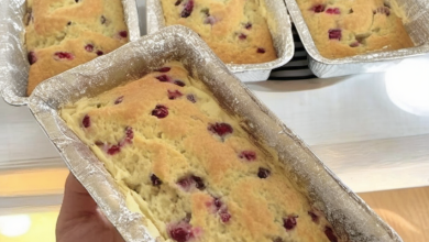 Delicious cranberry loaf topped with brown sugar crumble, perfect for holiday baking