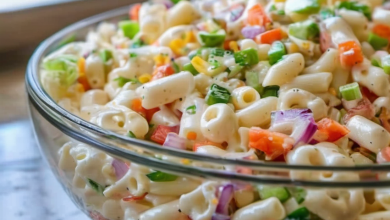 A delicious bowl of Hawaiian macaroni salad with elbow pasta, chopped vegetables, and creamy dressing