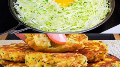 Golden brown cabbage and egg fritters served with a fresh salad and a dollop of sour cream