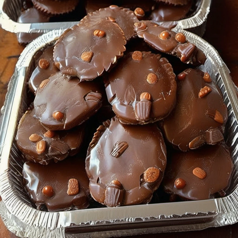 Arranging pecan halves on a baking sheet for homemade Turtle Candies