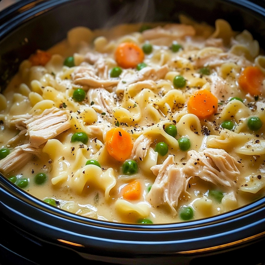 Skillet chicken and noodles with vegetables in a pan – a quick and healthy family meal rich in fiber and protein