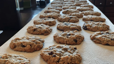 "Mixing ingredients for soft and chewy oatmeal raisin cookies, a classic family recipe