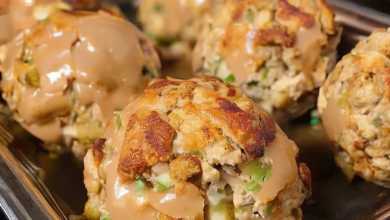 Mixing leftover stuffing and turkey to create delicious stuffing balls.