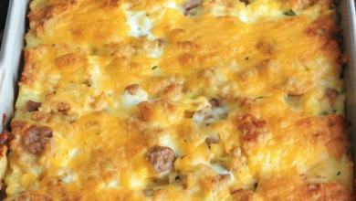 Sausage and Potato Breakfast Casserole fresh out of the oven with golden-brown edges and melted cheese.