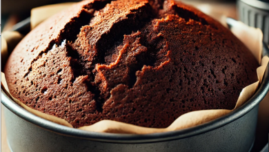 Freshly baked chocolate pound cake cooling on a wire rack, showing the golden-brown crust