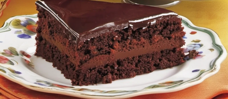 Rich and moist chocolate cake with smooth chocolate cream filling and a decadent frosting