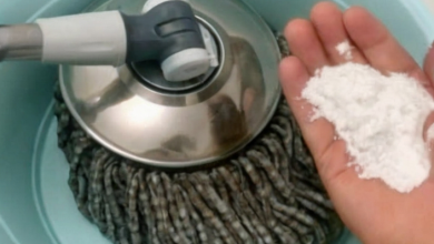 A clean, shiny wooden floor after using a homemade dust-resistant cleaning solution with household ingredients