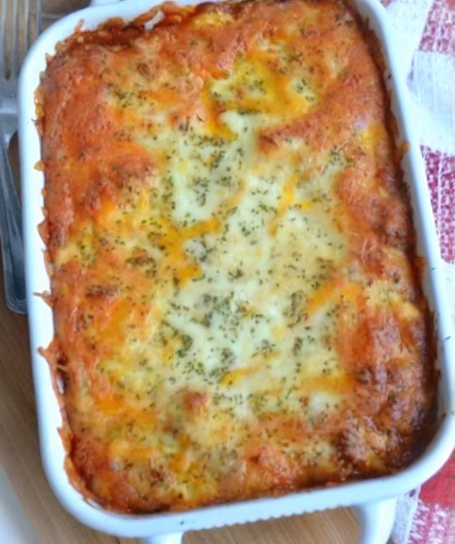 An easy and delicious layered ravioli lasagna with rich sauce and melted cheese, perfect for busy weeknights or gatherings.
