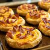 Flaky puff pastry pinwheels stuffed with bacon, eggs, and cheese—perfect for a quick & easy breakfast!