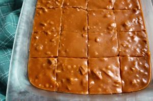 A traditional American caramel candy with chopped nuts, perfect for holidays and special occasions.