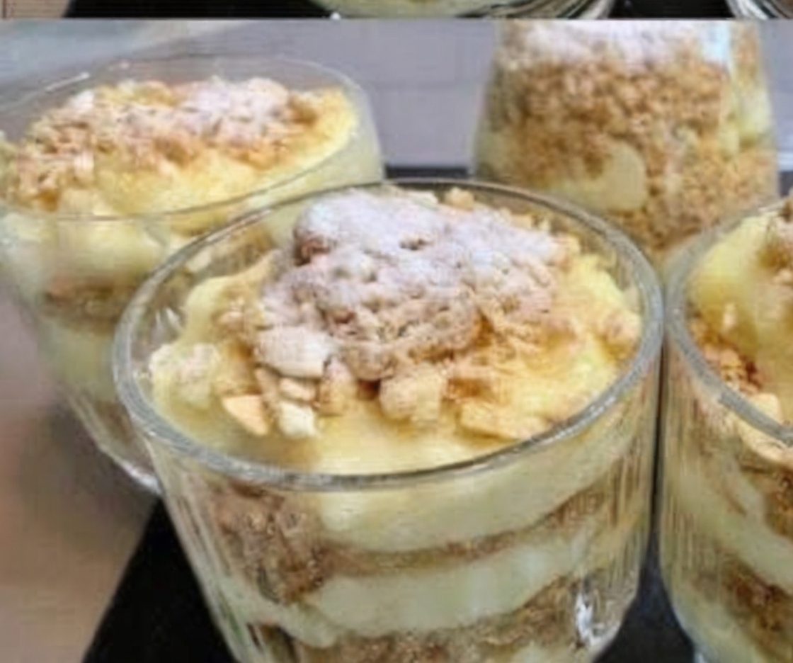 A no-bake layered dessert with whipped cream, mascarpone, crushed cookies, and fresh fruit—quick, easy, and perfect for any occasion!