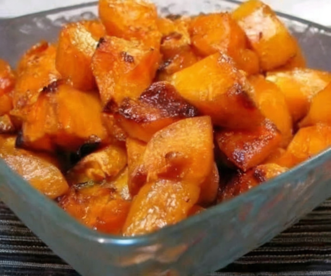 Bite-sized sweet potatoes roasted with brown sugar, cinnamon, nutmeg, and butter for a perfectly caramelized, cozy side dish.