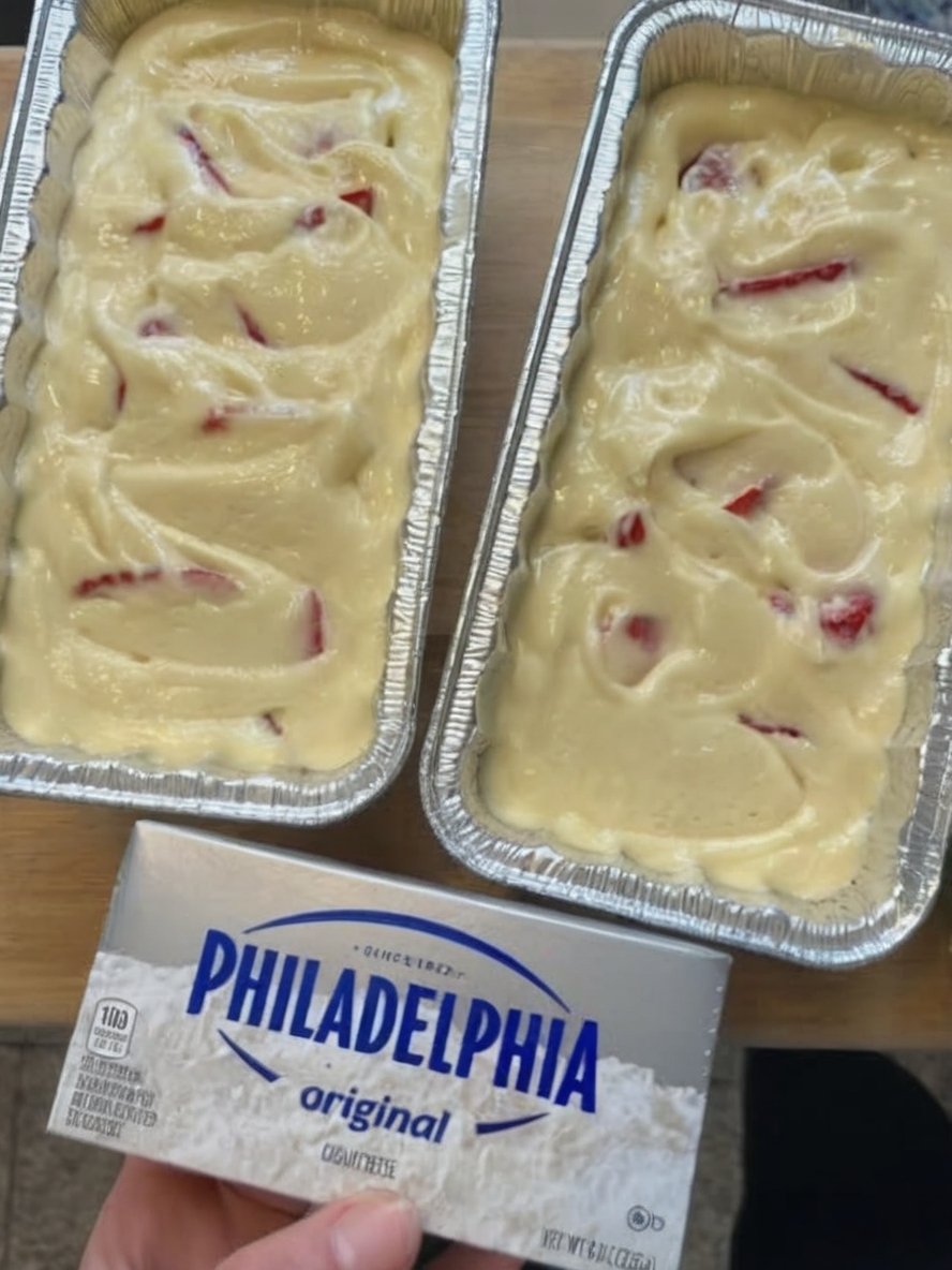 Moist, buttery loaf cake made with fresh strawberries and cream cheese, perfect for brunch or dessert.