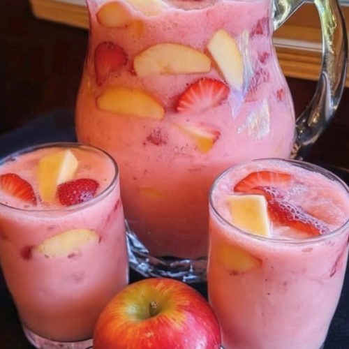 A creamy, fruity punch bursting with strawberries, apple juice, and a refreshing fizz. Perfect for parties, brunches, and celebrations!