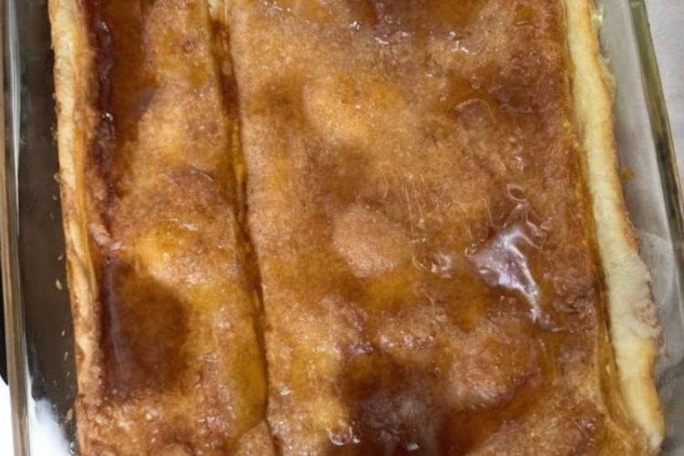 A rich, creamy cheesecake layered with flaky crescent dough and topped with cinnamon sugar. Easy, decadent, and crowd-pleasing!