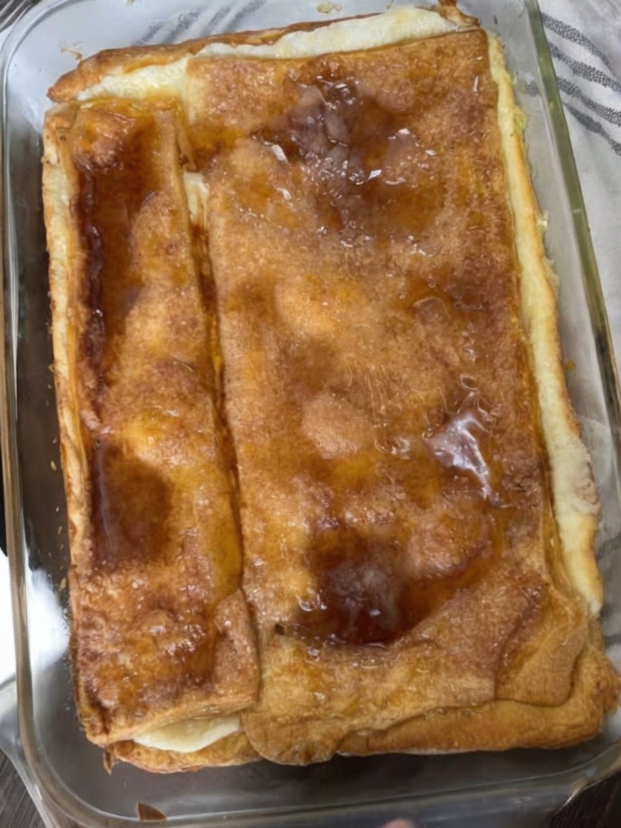 A rich, creamy cheesecake layered with flaky crescent dough and topped with cinnamon sugar. Easy, decadent, and crowd-pleasing!