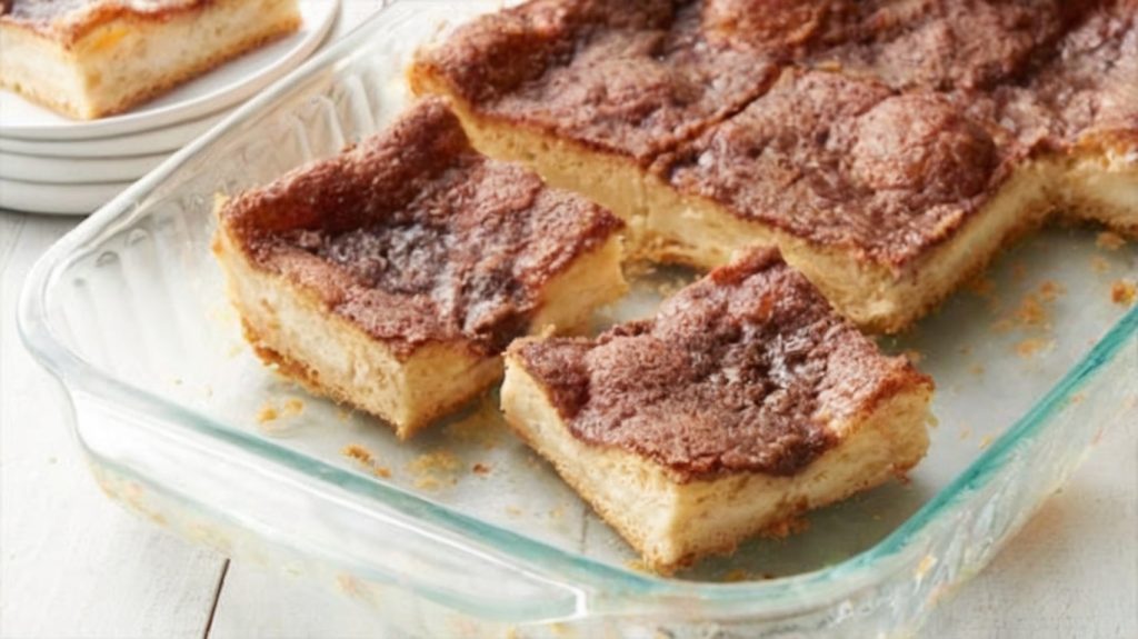 A rich, creamy cheesecake layered with flaky crescent dough and topped with cinnamon sugar. Easy, decadent, and crowd-pleasing!
