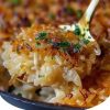 Easy oven-baked rice infused with savory French onion soup, beef consommé, and melted butter. A comforting side dish everyone loves.