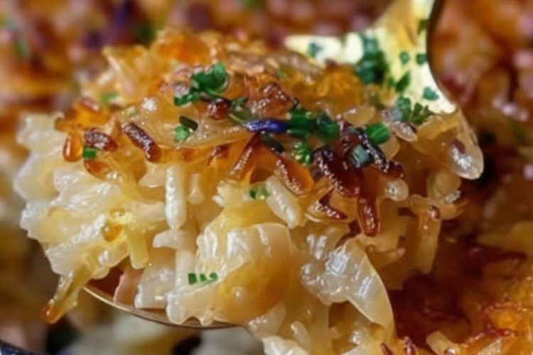 Easy oven-baked rice infused with savory French onion soup, beef consommé, and melted butter. A comforting side dish everyone loves.