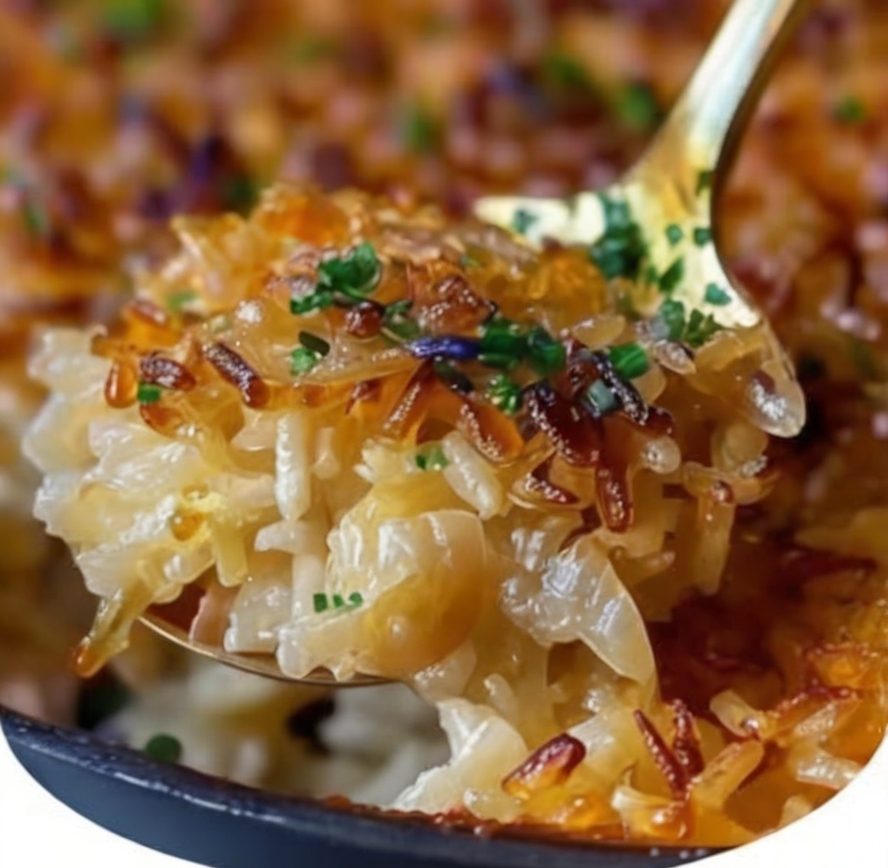Easy oven-baked rice infused with savory French onion soup, beef consommé, and melted butter. A comforting side dish everyone loves.