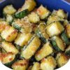 Crispy, tender zucchini cubes seasoned with garlic, Italian herbs, and Parmesan cheese—quickly cooked in the air fryer.