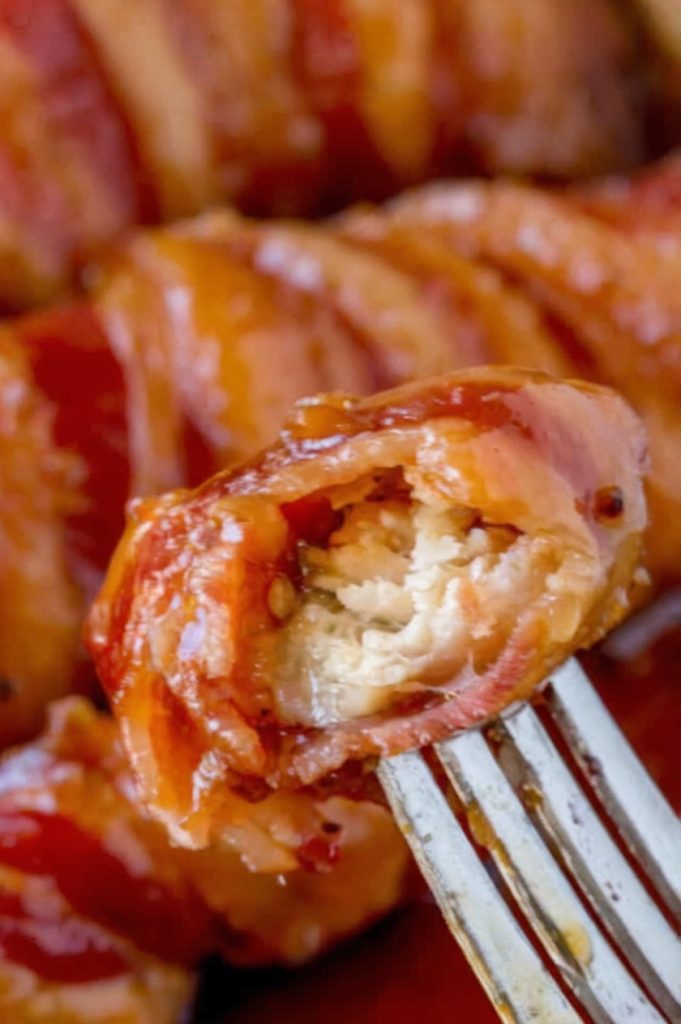 Juicy chicken tenders wrapped in crispy bacon and coated in a sweet brown sugar glaze. Quick, easy, and addictively delicious!