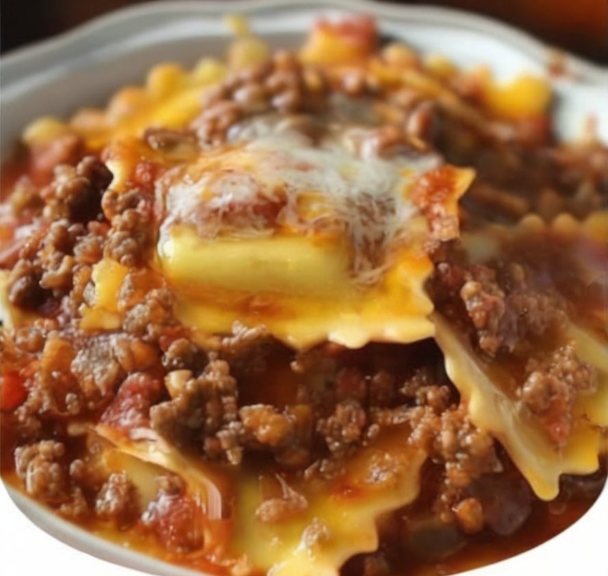 This easy Crockpot Ravioli Lasagna is a cheesy, hearty slow cooker meal that’s perfect for weeknights. Made with frozen ravioli, pasta sauce, and three kinds of cheese, it’s a family dinner winner