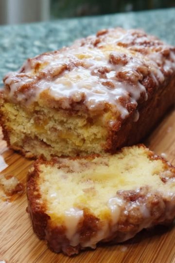 This apple fritter bread is filled with chopped apples and warm cinnamon, then topped with a sweet glaze for the ultimate bakery-style treat.