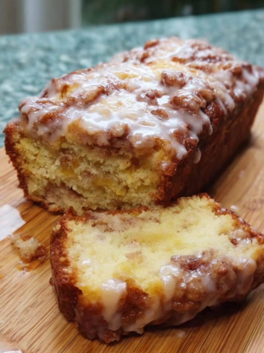 This apple fritter bread is filled with chopped apples and warm cinnamon, then topped with a sweet glaze for the ultimate bakery-style treat.