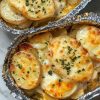 hese herb-infused Potatoes Au Gratin foil packets with tender leeks offer a gourmet experience with minimal effort and cleanup