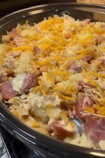 A creamy, cheesy slow cooker casserole packed with smoked sausage and potatoes. The perfect “dump and go” comfort meal.