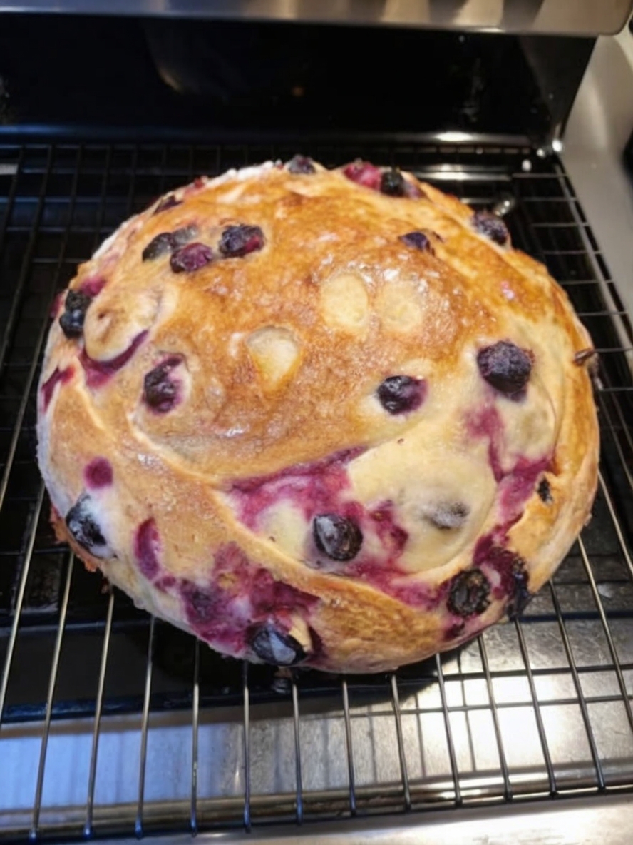 This bakery-style sourdough loaf is swirled with tangy lemon cream cheese and juicy blueberries. Perfect for breakfast, brunch, or gifting.