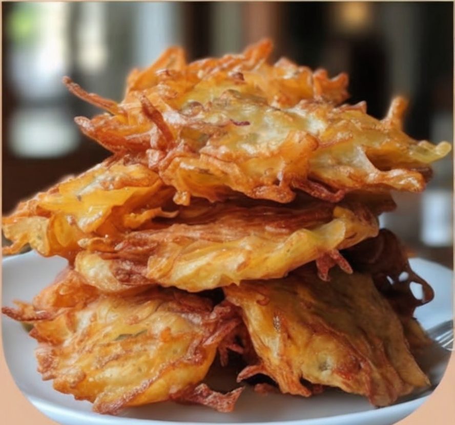 These classic onion fritters are golden, crispy, and packed with sweet onion flavor—perfect as a snack, side, or comfort food treat.