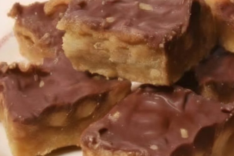 Rich caramel, crunchy pecans, buttery crust, and melty chocolate come together in these indulgent dessert bars.