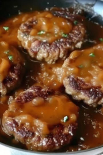 Rich, hearty, and smothered in savory onion gravy—this Salisbury Steak is pure comfort food perfection.