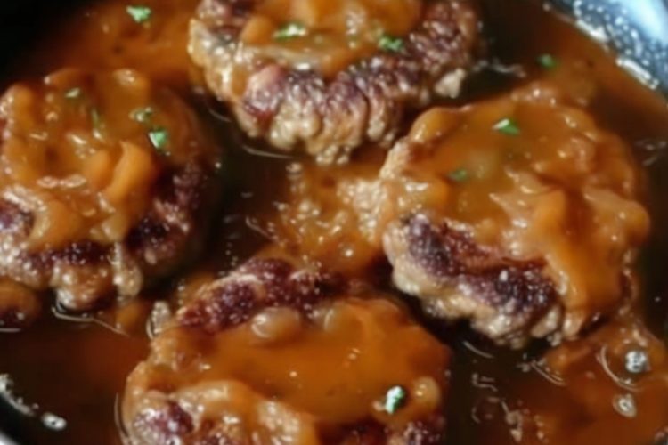 Rich, hearty, and smothered in savory onion gravy—this Salisbury Steak is pure comfort food perfection.