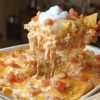 quick, and totally addictive—made with crushed Doritos, seasoned meat, and a creamy, spicy sauce.