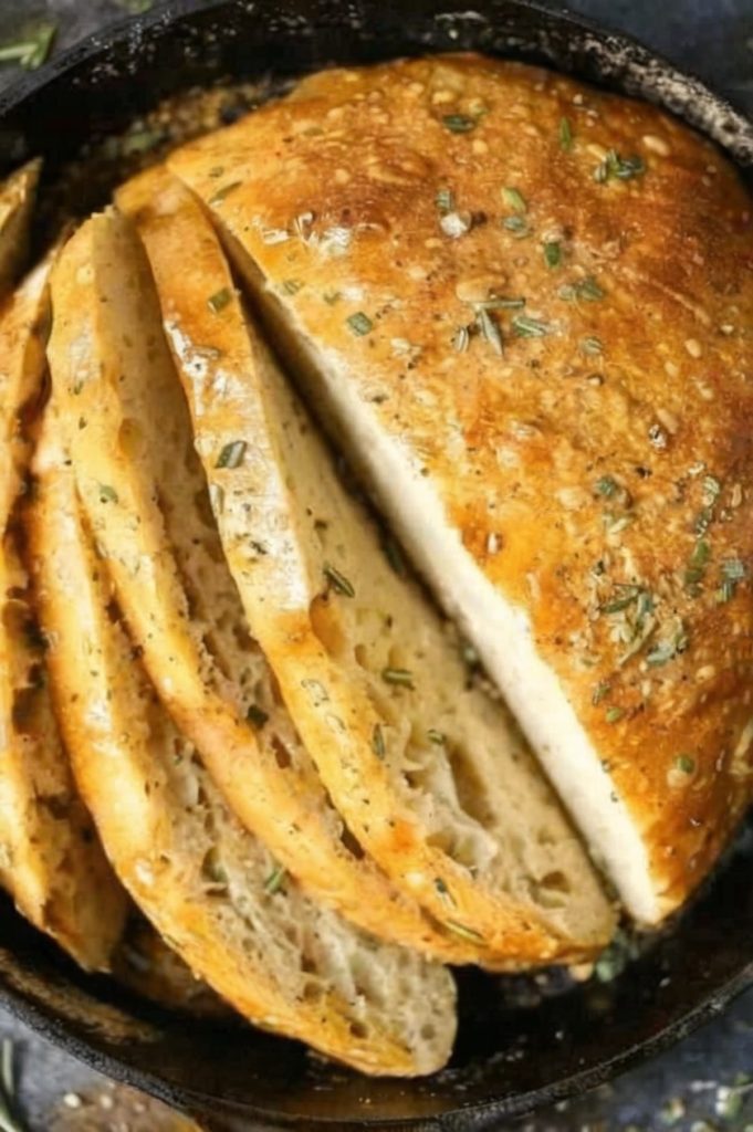 A crusty, flavorful artisan bread made with garlic and rosemary—no kneading required! Perfect for beginners and can be baked in the oven or air fryer.