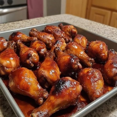 Juicy drumsticks baked in the oven, glazed with sweet and smoky honey BBQ sauce—a family favorite!