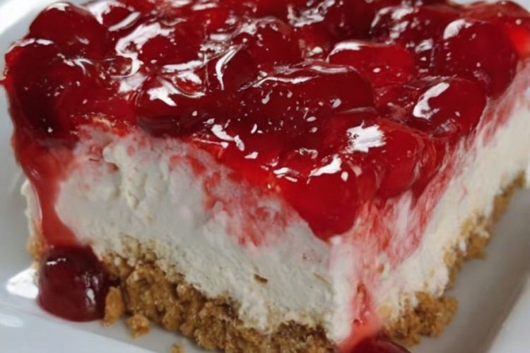 Creamy, easy cheesecake bars with a buttery graham cracker crust and sweet cherry topping. No baking required!