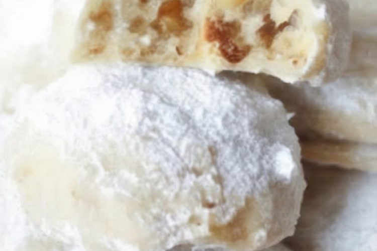 A buttery, melt-in-your-mouth cookie coated generously in powdered sugar—a festive favorite you'll love making year after year!