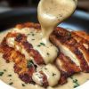 A crispy, cheesy chicken breast topped with a rich, velvety garlic butter sauce—comfort food that feels restaurant-worthy.