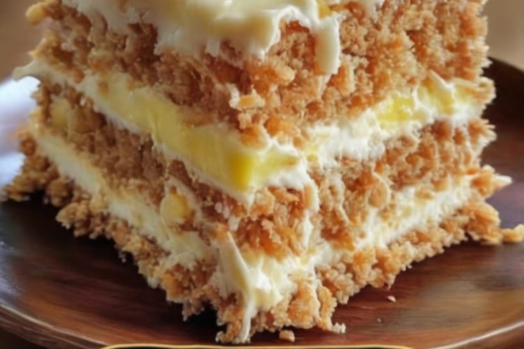 A super moist, flavorful carrot cake with pineapple and a dreamy cream cheese frosting.