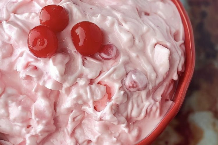 Sweet, creamy, and fluffy dessert packed with pineapple, marshmallows, and optional cherries or coconut.