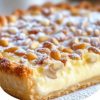 An Italian classic featuring a lemon-scented custard in tender pastry, dusted with powdered sugar.