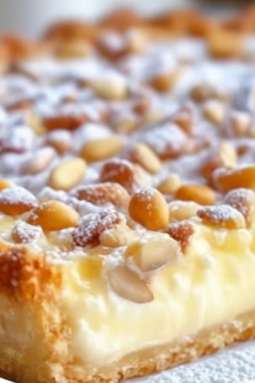 An Italian classic featuring a lemon-scented custard in tender pastry, dusted with powdered sugar.